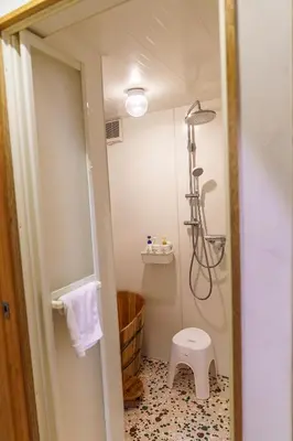 a small bathroom with a shower and a toilet at 70m2 House in central Tokyo in Tokyo