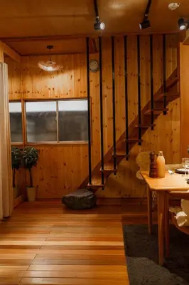a room with a wooden staircase in a house at 70m2 House in central Tokyo in Tokyo