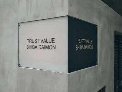 a sign on the side of a building at illi Rom Hamamatsucho in Tokyo