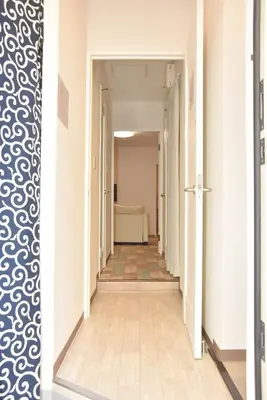 a corridor of an empty room with a hallway at 1棟貸切 宮元 みやげん in 浅草&雷門 - Miyagen in Asakusa&Kaminarimon- 浅草駅徒歩4分 上野や秋葉原までアクセス良好 最大16名 in Tokyo