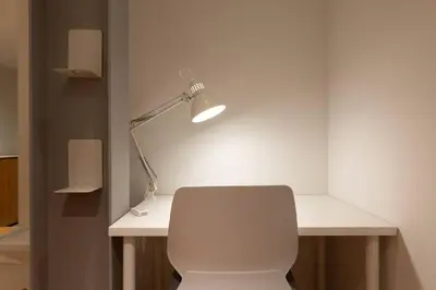 a white desk with a lamp and a white toilet at \u30a2\u30f3\u30c9\u30b9\u30c6\u30a4\u6771\u5411\u5cf66\u4e01\u76ee302 Soi house in Tokyo