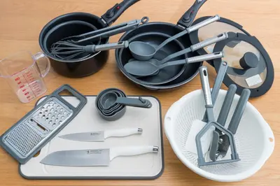 a bunch of kitchen utensils sitting on a table at Spacious 1120feet , 3-Bedroom Apartment near Ikebukuro, 2 Minutes to Train in Tokyo
