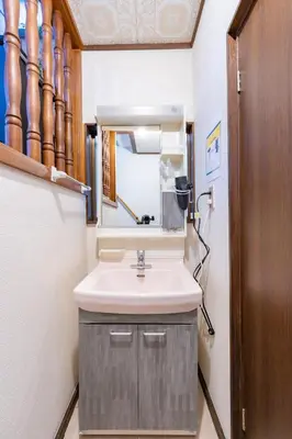 a bathroom with a sink and a mirror at TK House Tokyo Ikebukuro Max5PPL in Tokyo