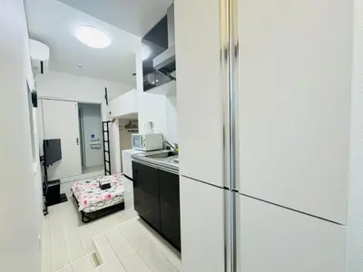 a kitchen with a sink and a refrigerator at Real Waseda SJ0261 in Tokyo