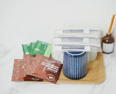 a wooden cutting board with various items on it at \u6771\u4eac\u30ea\u30ea\u30a2\u30eb\u30db\u30c6\u30eb401 in Tokyo