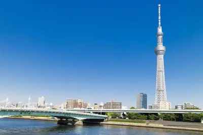 a view of the eiffel tower from the river at Asakusa and Ueno Area, 2 Minutes to Iriya Station, Very Convenient in Tokyo