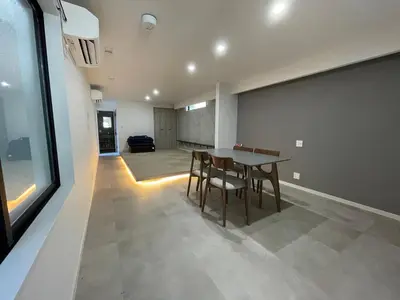 a dining room with a table and chairs at COTO Premium Shibuya A in Tokyo