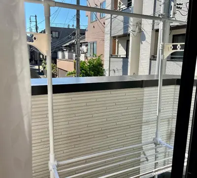 a view from a balcony with white rails at \u4e1c\u4eac\u6c60\u888b\u57ce\u5e02\u4f4f\u5bbf-Ikebukuro Urban Stay in Tokyo