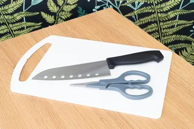 a pair of scissors in a white box on a table at GraceCourt Oyama Near Ikebukuro Studio Apartment in Tokyo