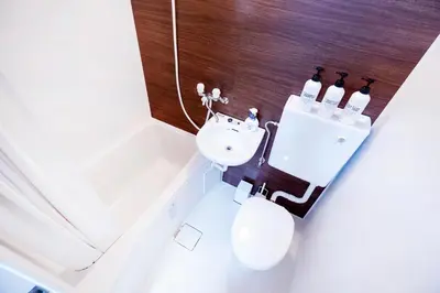 a bathroom with a sink and a toilet at CG Charming Guesthouse in the Heart of Okubo \u4e36Steps to Metro and Convenient Travel! YoE4 in Tokyo