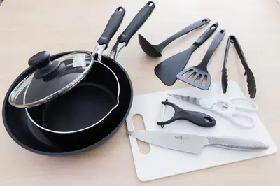 a bunch of cooking utensils sitting on a table at 2 Minutes Walk to Ikebukuro Station, Central Tokyo and Very Convenient in Tokyo