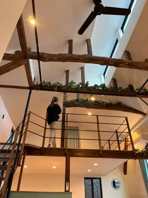 a man is taking a picture of a room at House22 -Brand new house in Tokyo