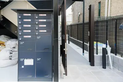 a pair of blue lockers in a building at QH202, Newly renovated hotel, direct access to Ueno, Asakusa, Disneyland, Airport in Tokyo