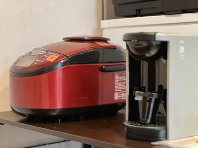 a red toaster sitting on top of a counter at Kenki Torigoe House-TT0173 in Tokyo
