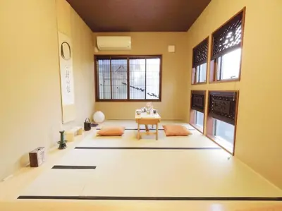 a room with mats on the floor of a room at Tsubaki Salon Jujo in Tokyo
