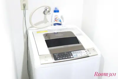 a washing machine with a bottle on top of it at Avanti Room 203-301 - Vacation STAY 68751v in Tokyo