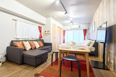 a living room with a couch and a table at N1-2Shinjuku luxury house with EV Max6P in Tokyo