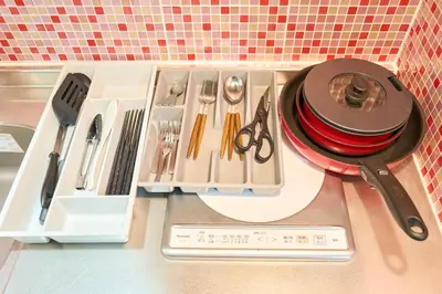 a tray with utensils and a hat on a counter at N1-2Shinjuku luxury house with EV Max6P in Tokyo