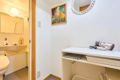 a bathroom with a sink and a camera on a counter at N2-3Shinjuku luxury house with EV Max6P 4min to Sta in Tokyo