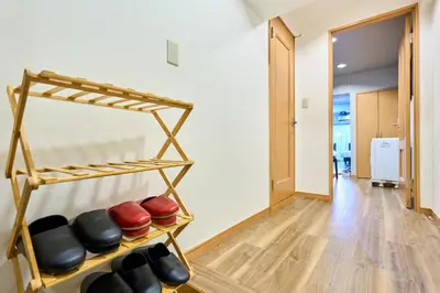 a room with a rack of boxing gloves at N2-3Shinjuku luxury house with EV Max6P 4min to Sta in Tokyo