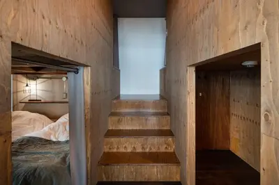 a room with a staircase leading to a bedroom at Rakuna Inn \u548c Honjo-Azumabashi in Tokyo