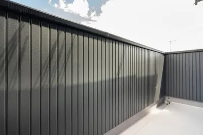 a black metal fence with a sky in the background at \u5343\u4f4f\u6cb3\u539f\u753a2f 3f in Tokyo