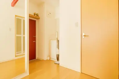 an empty room with a door and a wooden floor at 203 Modern Comfort in Shinjuku Triple Station Access Free Wi-Fi in Tokyo