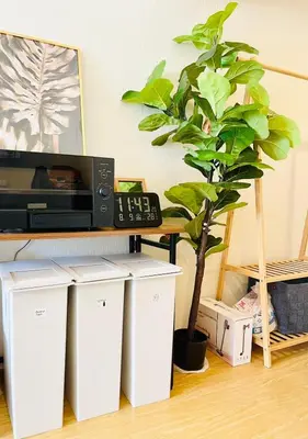 a tv sitting on a shelf next to a plant at Alo BnB 12 - Game Universe - Easy Access to Shibuya - New ! in Tokyo