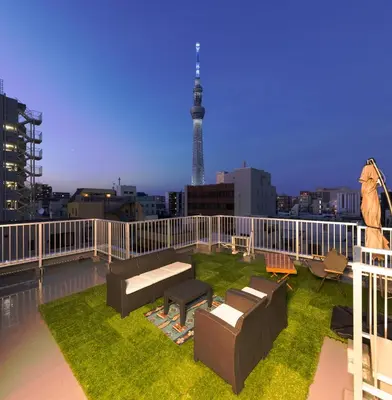 a balcony with a view of the eiffel tower at Walk to Asakusa, Sky tree MAX16P in Tokyo