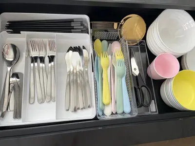 a drawer filled with utensils and plates and forks at Walk to Asakusa, Sky tree MAX16P in Tokyo