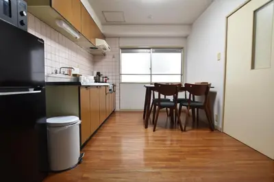 a kitchen with a table and chairs in it at Randor Residence Tokyo Grand in Tokyo