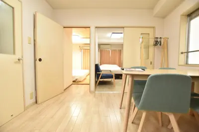 a room with a table and chairs in a room at Randor Residence Tokyo Grand in Tokyo