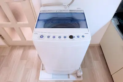 a washer and dryer sitting in a room at Heisei Mansion - Vacation STAY 17520 in Tokyo