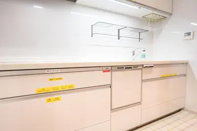 a kitchen with white cabinets and yellow counters at Kita Akabane-Diamond Yu - Vacation STAY 84219v in Tokyo
