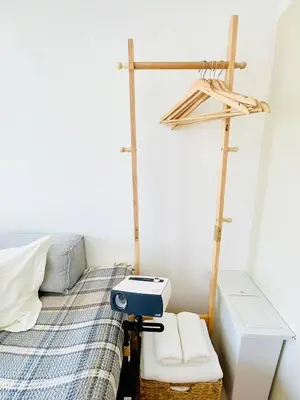 a small bedroom with a bed with a desk at Alo BnB 14 - Cats and Coffee - Near Shibuya ! Self check-in in Tokyo