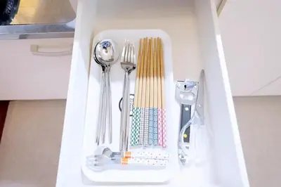 a white tray with utensils in a drawer at Yoyogi Flats - Vacation STAY 17486 in Tokyo