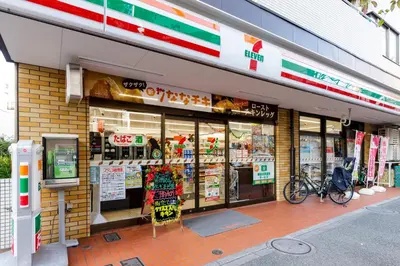 a store front of a store with a bike parked outside at \u590f\u76ee\u5742\u306e\u9593Room2 in Tokyo