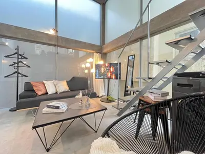 a living room with a couch and a table at \u590f\u76ee\u5742\u306e\u9593Room2 in Tokyo
