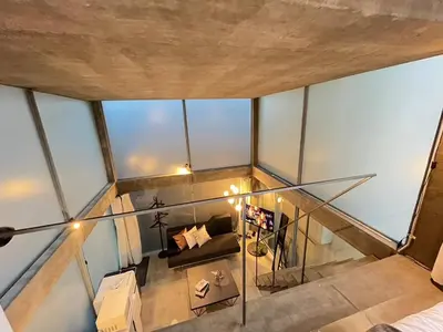 an overhead view of a living room in a loft at \u590f\u76ee\u5742\u306e\u9593Room2 in Tokyo