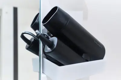 a black coffee cup hanging on a wall at Seacrest Nakanobu by Tranova in Tokyo