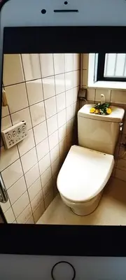 a bathroom with a white toilet and a sink at kyoka house\u6c60\u888b\u81f3\u8fd1 in Tokyo