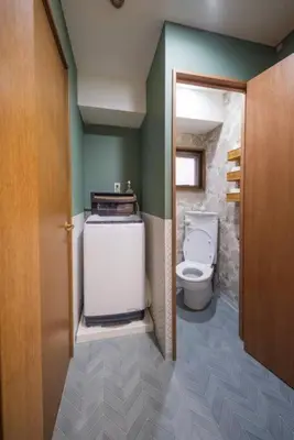 a small bathroom with a toilet and a sink at HARMONIa\u6771\u4eac\u5800\u5207202 in Tokyo