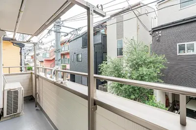a balcony with a view of a building at Otsuka house with 3BR near the Yamanote line in Tokyo