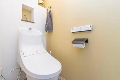 a bathroom with a white toilet in a room at Nishisugamo Full Renovated House Next to a Cherry Blossom Park in Tokyo