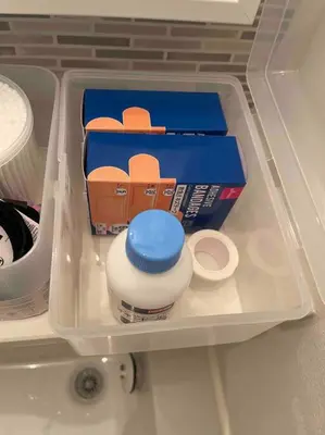 a drawer in a refrigerator filled with toys and boxes at Nishisugamo Full Renovated House Next to a Cherry Blossom Park in Tokyo
