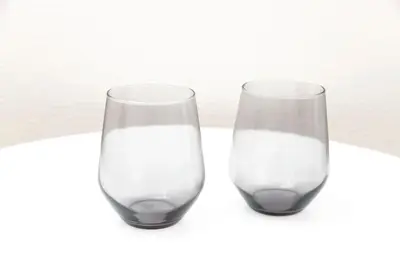 two glasses of milk sitting next to each other at FIKA Shibuya Honmachi 102 in Tokyo