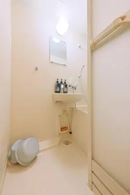 a bathroom with a toilet and a sink at \u6075\u6bd4\u5bff\u99c5\u304b\u3089\u5f92\u6b691\u5206 \u6e0b\u8c373\u5206 \u65b0\u5bbf10\u5206 30m2\u3067\u3086\u3063\u305f\u308a \u6700\u9ad8\u306e\u7acb\u5730 303\u53f7\u5ba4 in Tokyo