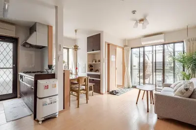 a kitchen and living room with a couch and a table at Tokoryokan - Takasago - Vacation STAY 58684v in Tokyo