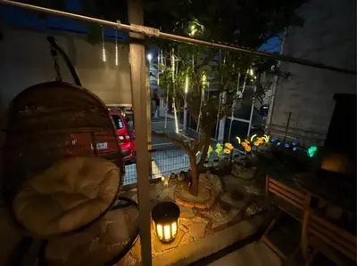 a view of a window at night with a tree at Tokoryokan - Takasago - Vacation STAY 58684v in Tokyo