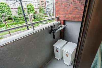 a balcony with two toilets in front of a building at Tokyo Ichiban Kabukicho in Tokyo